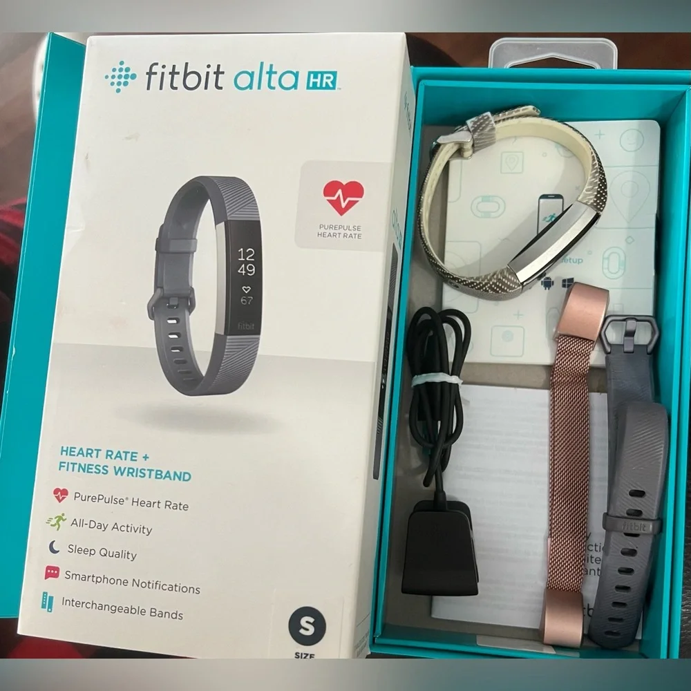 Fitbit Black Fitness Wristband S-L, includes multiple bands.